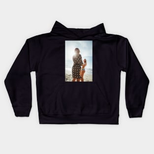 Two Young Pretty Blond Girls Holding Hands and Laughing Together on Sunny Beach Kids Hoodie